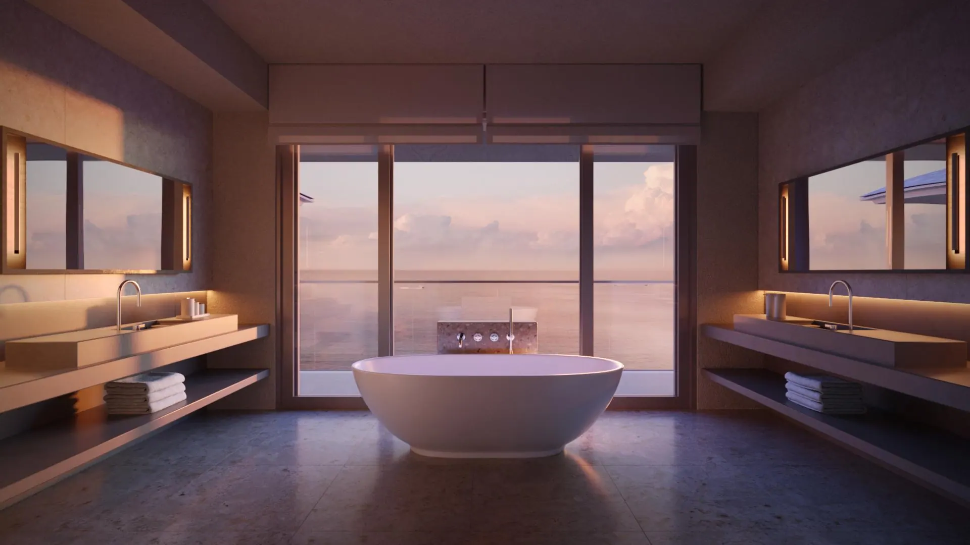 A villa bathroom with a freestanding tub facing the sea