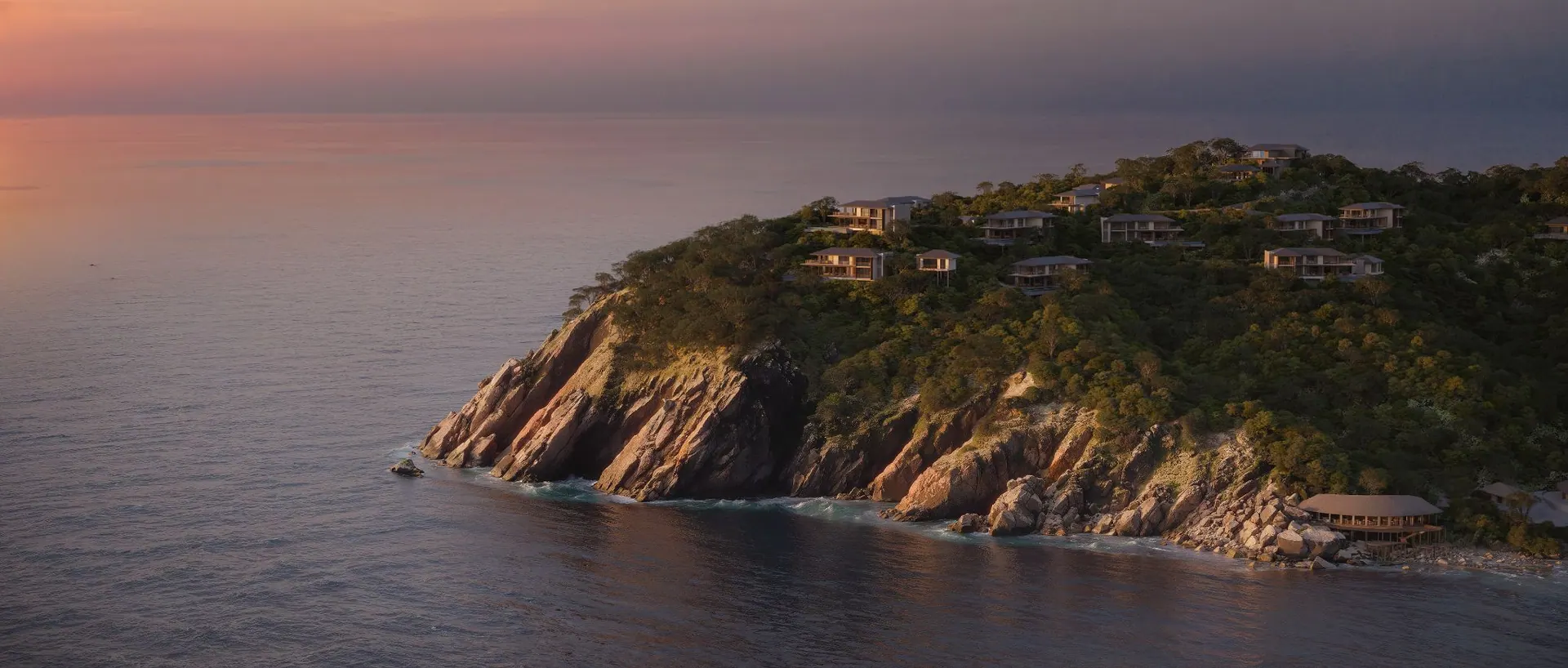 Mandarin Oriental Bai Nom on its headland at dusk
