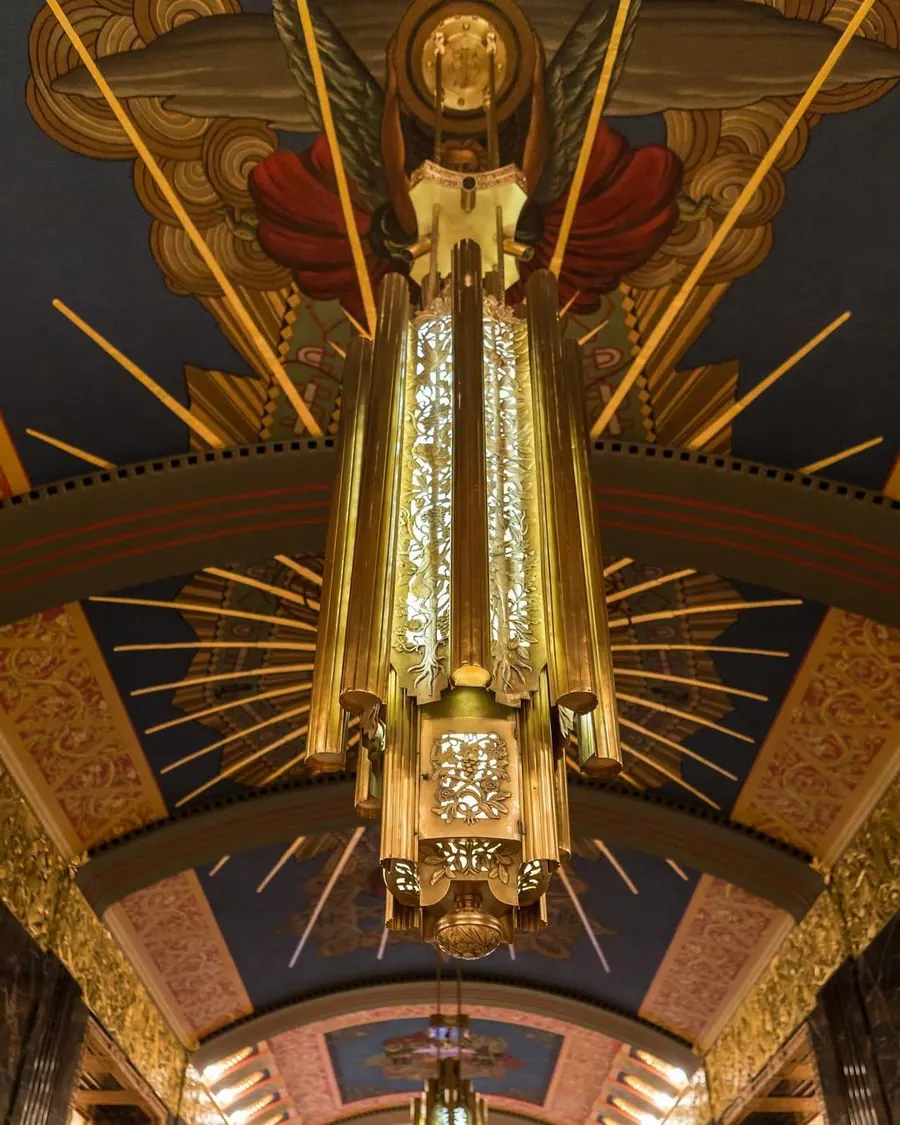 An Art Deco chandelier hanging in the 100 Barclay lobby