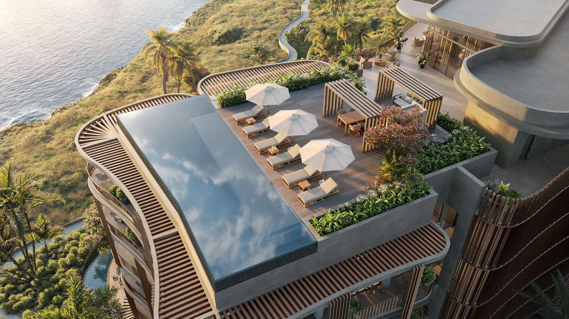 A rooftop pool and cabanas seen from above