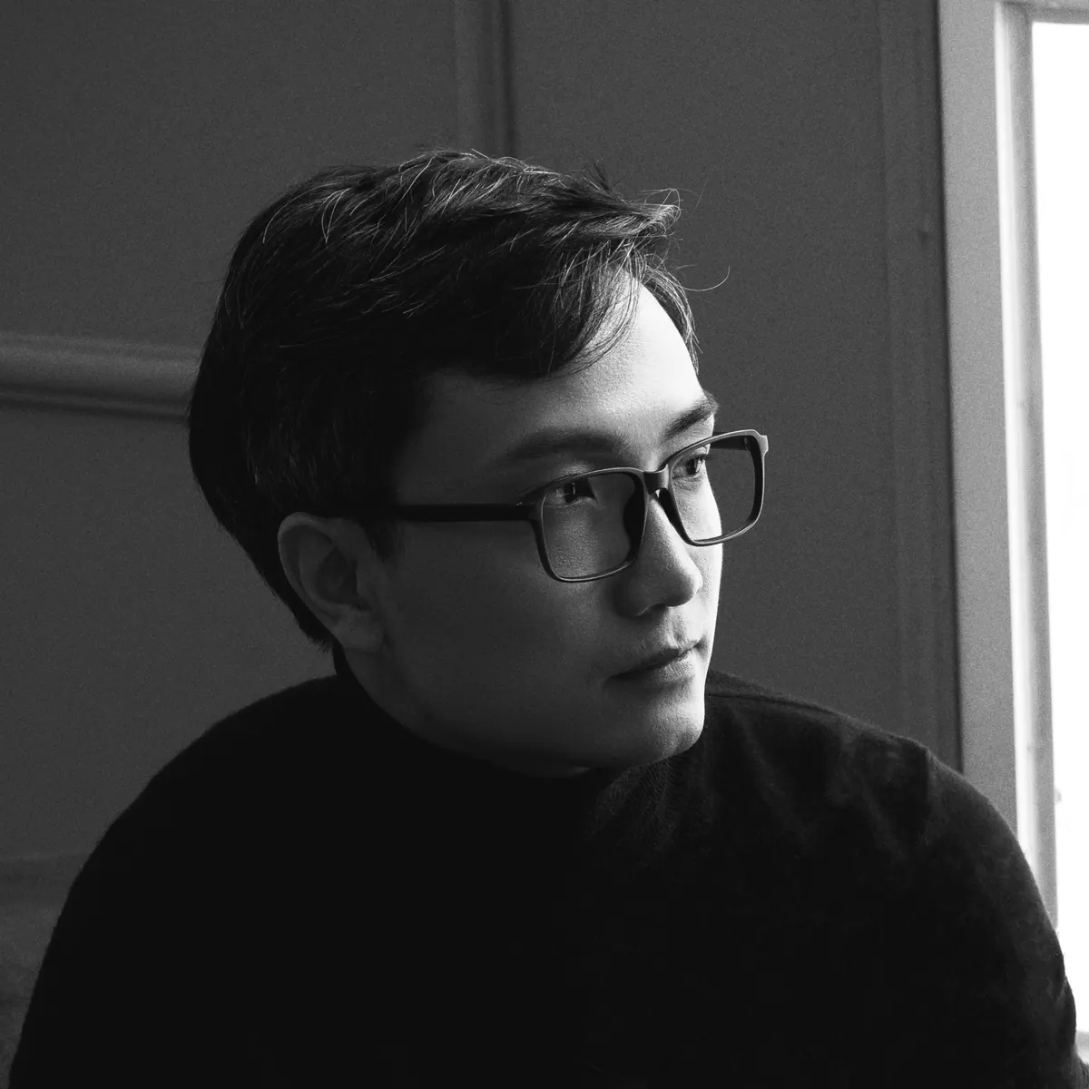 Dexter Nguyen, founder of 4pixos, in black and white