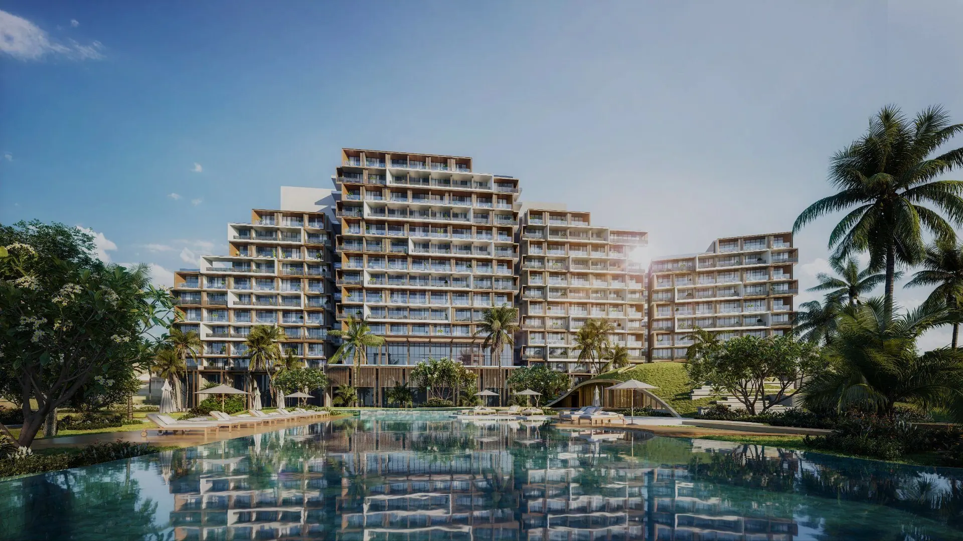 Hyatt Regency Ho Tram terraced hotel above a palm-fringed pool