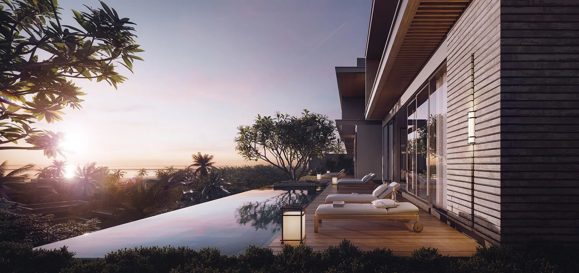 A villa infinity pool at sunset