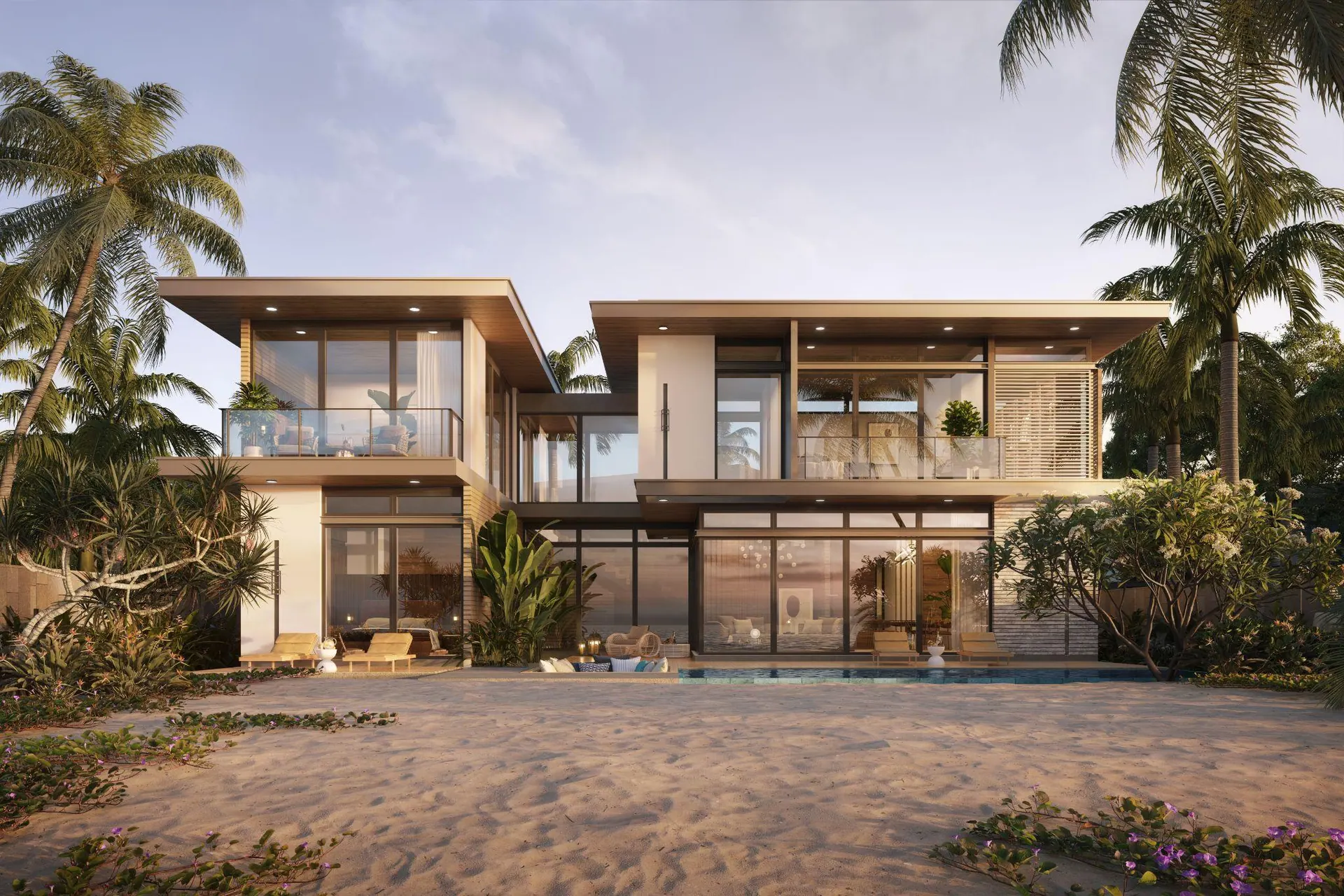 A villa facade opening onto the beach