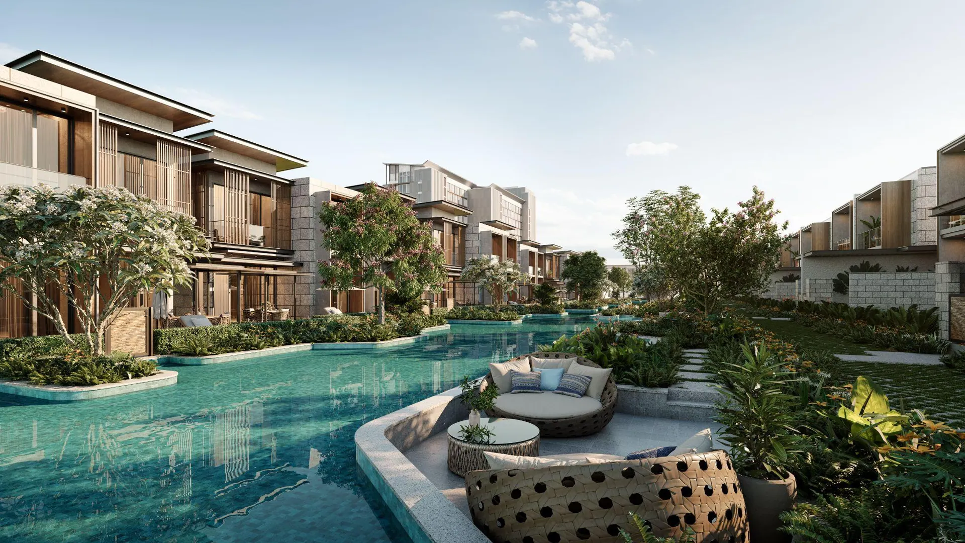 A lounge pool between the villa rows