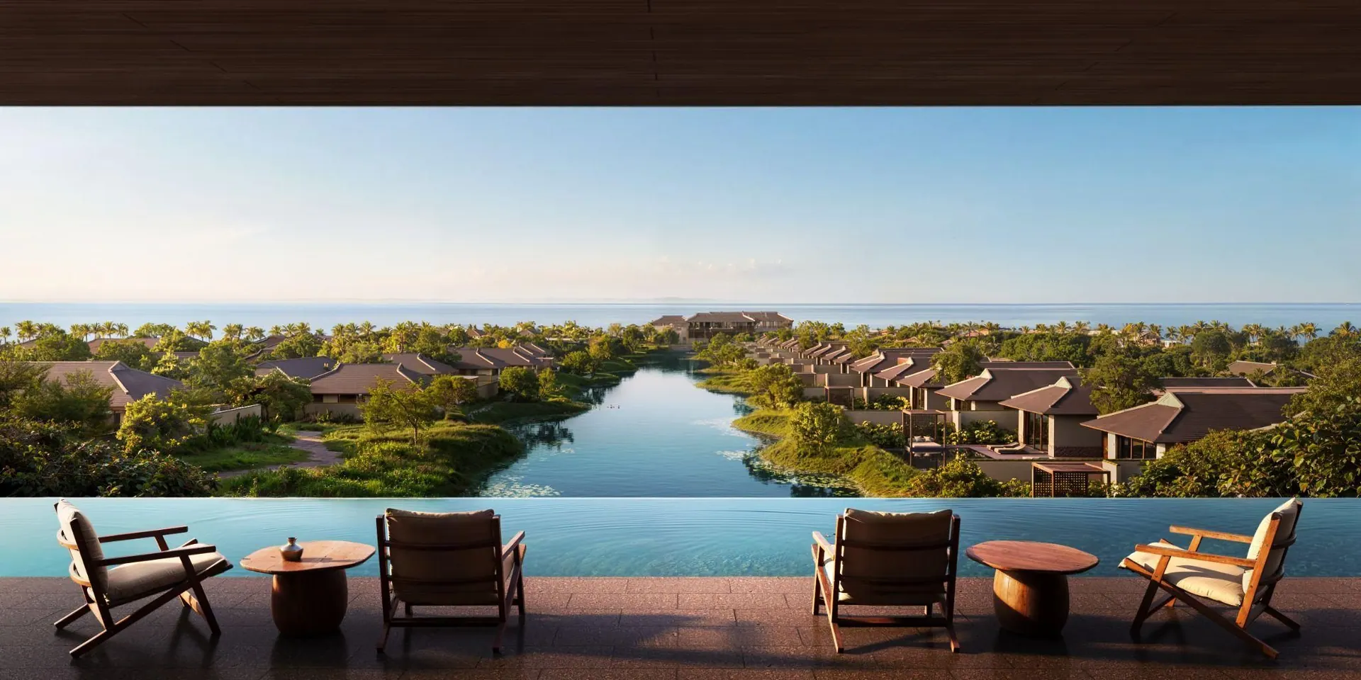 Mandarin Oriental Da Nang villas around a lagoon, seen from a terrace