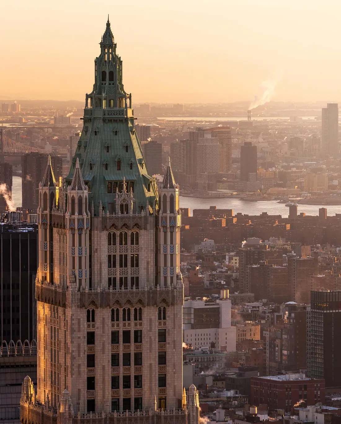 The Woolworth Building crown above Tribeca at sunset